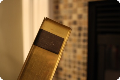 removing brass bar on fireplace